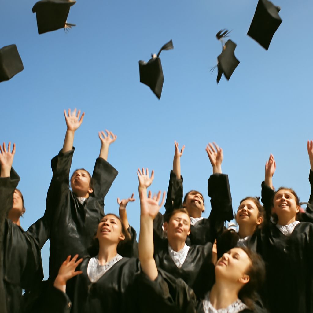 Students celebrating affordable college education